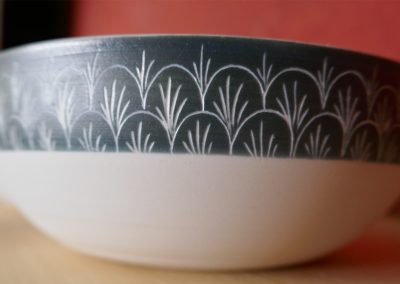 Bols gris frise haut et motifs